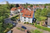 Außenansicht (5) - Attraktives Mehrfamilienhaus mit 3 Wohneinheiten & 2 Garagen in Langenhagen! Mein Haus = Mein Makler