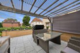 Terrasse - Attraktives Mehrfamilienhaus mit 3 Wohneinheiten & 2 Garagen in Langenhagen! Mein Haus = Mein Makler