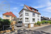 Außenansicht - Attraktives Mehrfamilienhaus mit 3 Wohneinheiten & 2 Garagen in Langenhagen! Mein Haus = Mein Makler