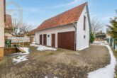 Hausansicht Garage - Modernisiertes Einfamilienhaus mit Garten und Garage in Peine-Schmedenstedt! Mein Haus=Mein Makler!