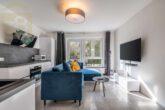 Wohnzimmer mit Küche - Neuwertige 2-Zimmer-Wohnung in Braunschweig mit Terrasse! Meine Wohnung = Mein Partner!