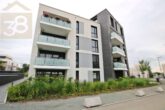 Hausansicht - Vermietete 2-Zimmer Wohnung mit Tiefgarage und Balkon Steimker Gärten! Meine Wohnung = Mein Makler!