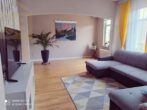 2. OG Wohnzimmer_1 - Gute Kapitalanlage: Wohn- und Geschäftshaus in zentraler Lage Helmstedts!- Mein Haus – mein Makler!
