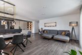 Wohnzimmer - Neuwertige 4 Zimmerwohnung mit Balkon und Fahrstuhl im Kleekamp – Meine Immobilie=Mein Partner!