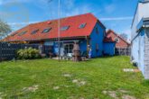 Garten mit Hausansicht - Gepflegtes Reihenendhaus mit Garten und Carport in Ettenbüttel (Müden a.d. Aller)!