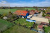 Gartenansicht - Gepflegtes Reihenendhaus mit Garten und Carport in Ettenbüttel (Müden a.d. Aller)!