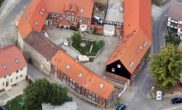 Luftbild - 14 vermietete Wohneinheiten bei Bad Helmstedt als Kapitalanlage! Mein Haus = Mein Makler!