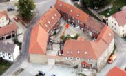 Luftbild - 14 vermietete Wohneinheiten bei Bad Helmstedt als Kapitalanlage! Mein Haus = Mein Makler!