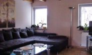Wohnzimmer - 14 vermietete Wohneinheiten bei Bad Helmstedt als Kapitalanlage! Mein Haus = Mein Makler!