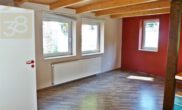 Wohnzimmer - 14 vermietete Wohneinheiten bei Bad Helmstedt als Kapitalanlage! Mein Haus = Mein Makler!