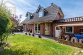 Gartenansicht mit Terrasse - Einfamilienhaus in ruhiger Lage in Eischott bei Wolfsburg mit Garage! Mein Haus = Mein Partner!